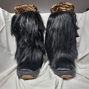 Oscar black fur boots.